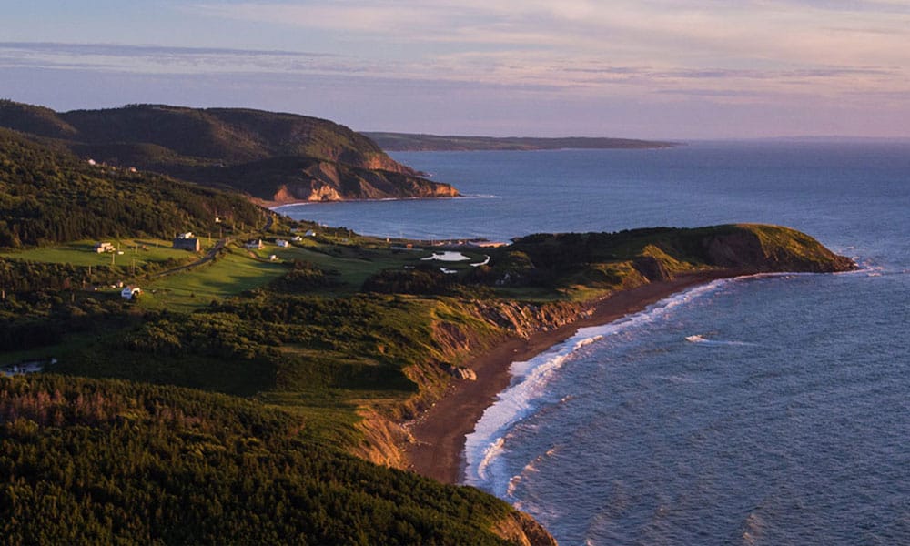 Aerial view of a stunning green coastline