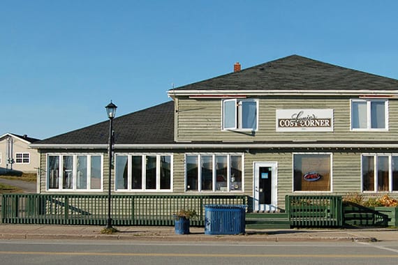 Exterior of a cafe with a sign that reads Louie's Cosy Corner