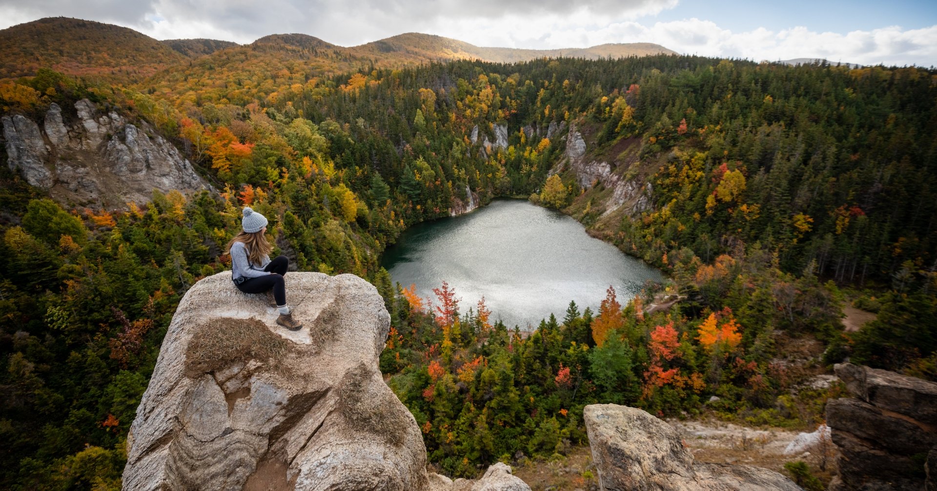 hiker stop to admire the fall foliage at the Gypsum Mine Quarry trail